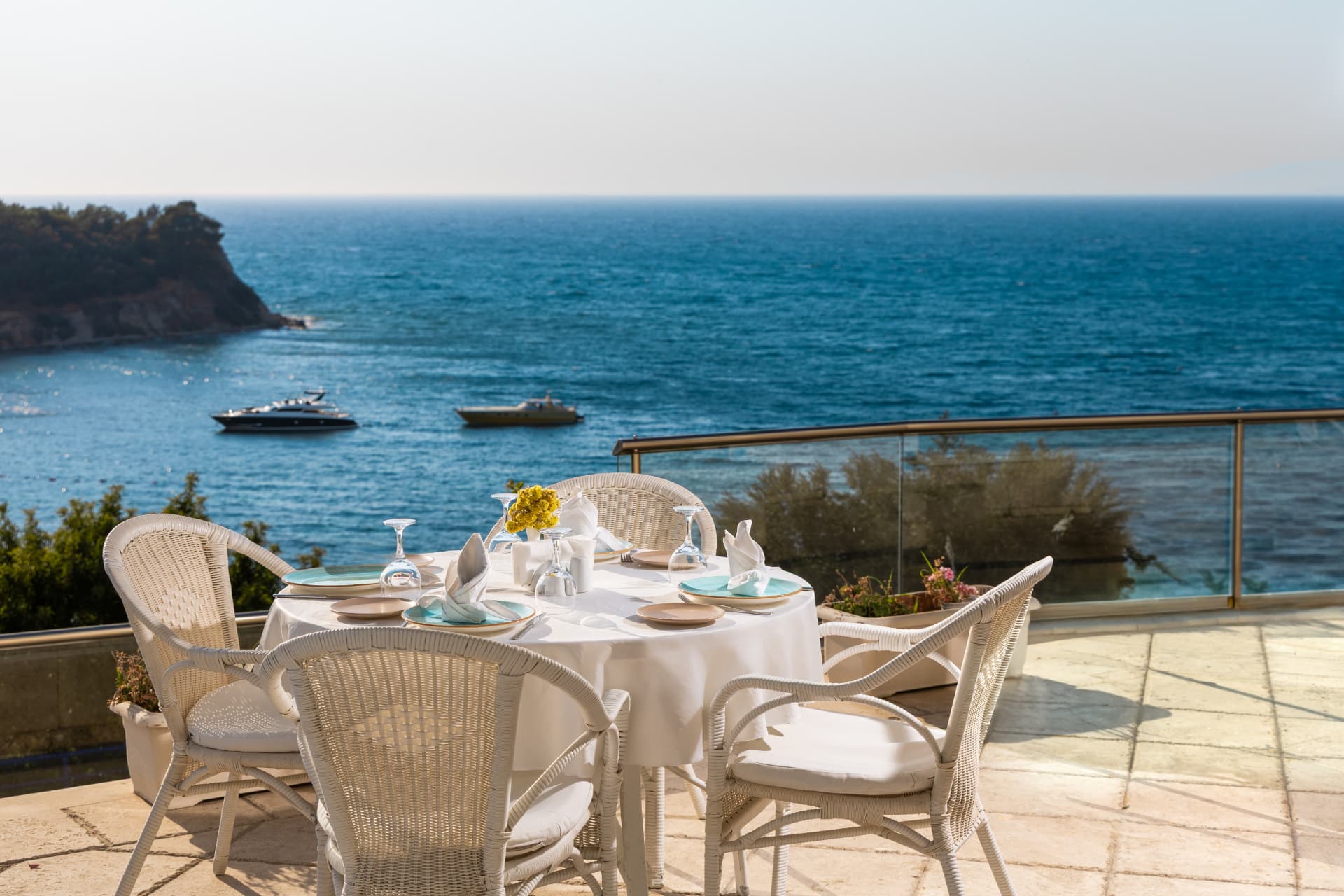 Table set for lunch with a view of the bay